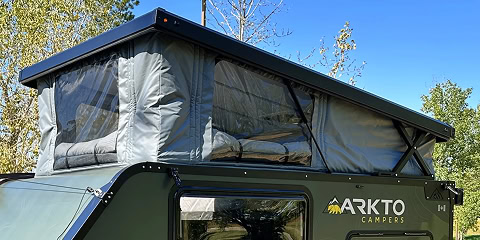 Rooftop air conditioner unit mounted on Arkto Campers trailer roof
