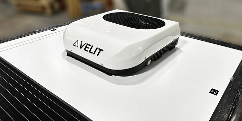 Rooftop air conditioner unit mounted on Arkto Campers trailer roof