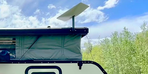 Starlink antenna mounted on Arkto Campers overland travel trailer